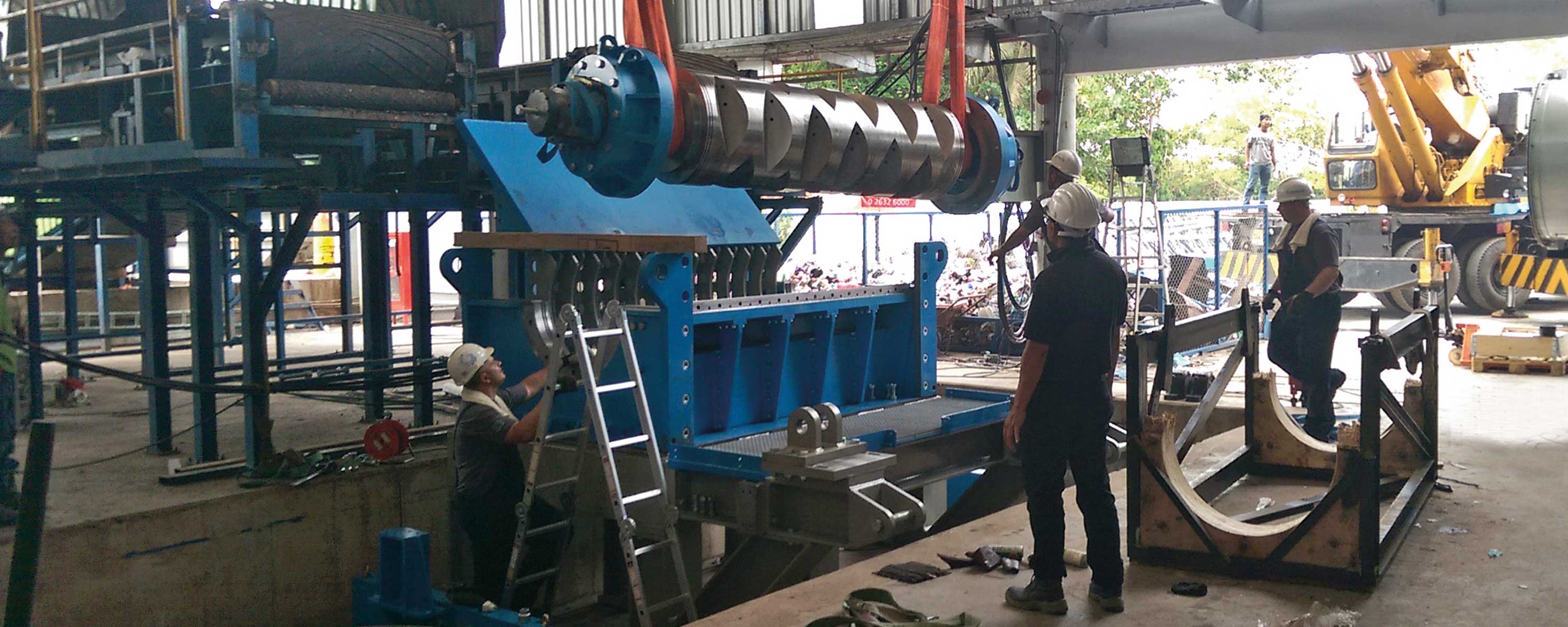Shaft being lowered into a recycling machine